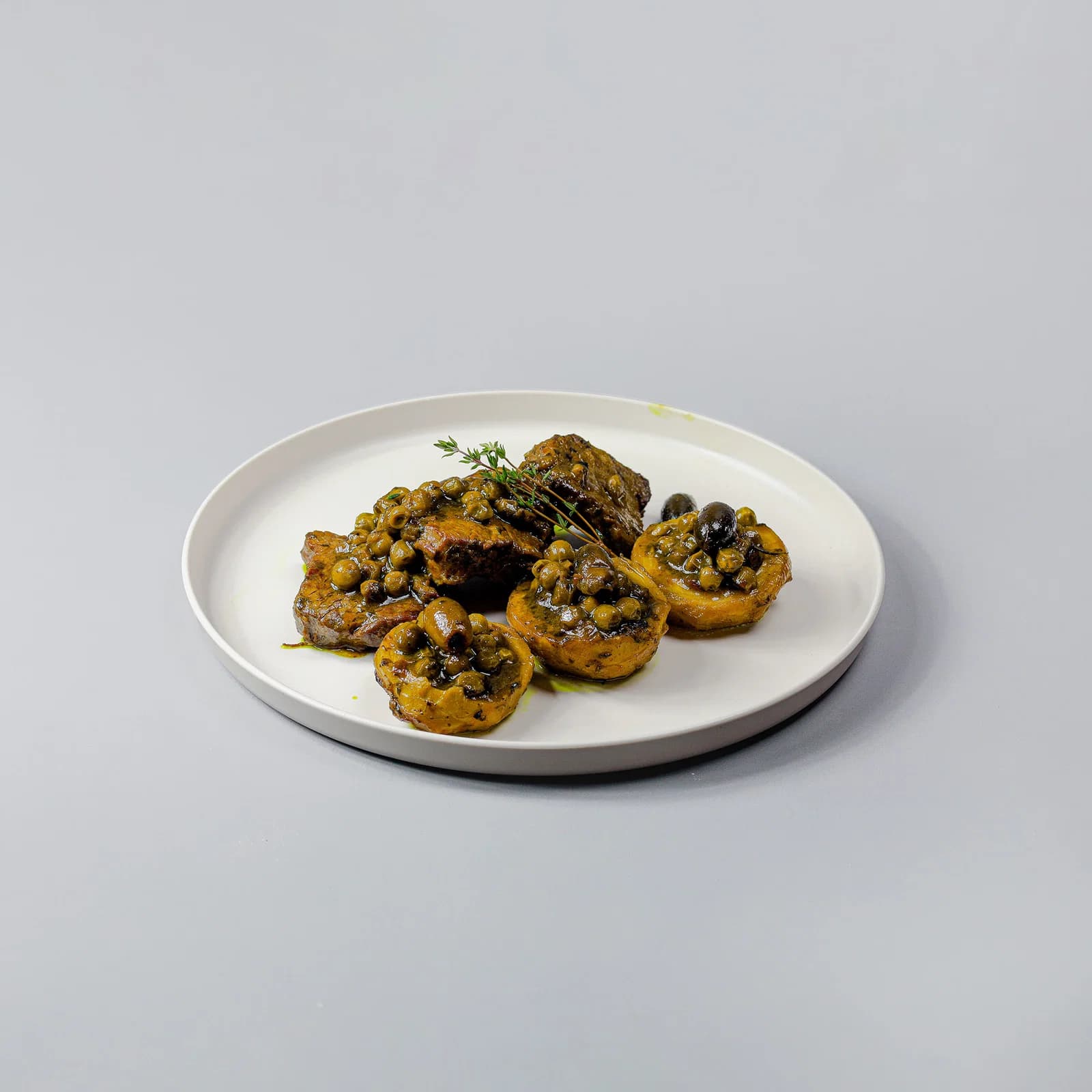 Moroccan beef Tajine with Artichoke & Green Peas