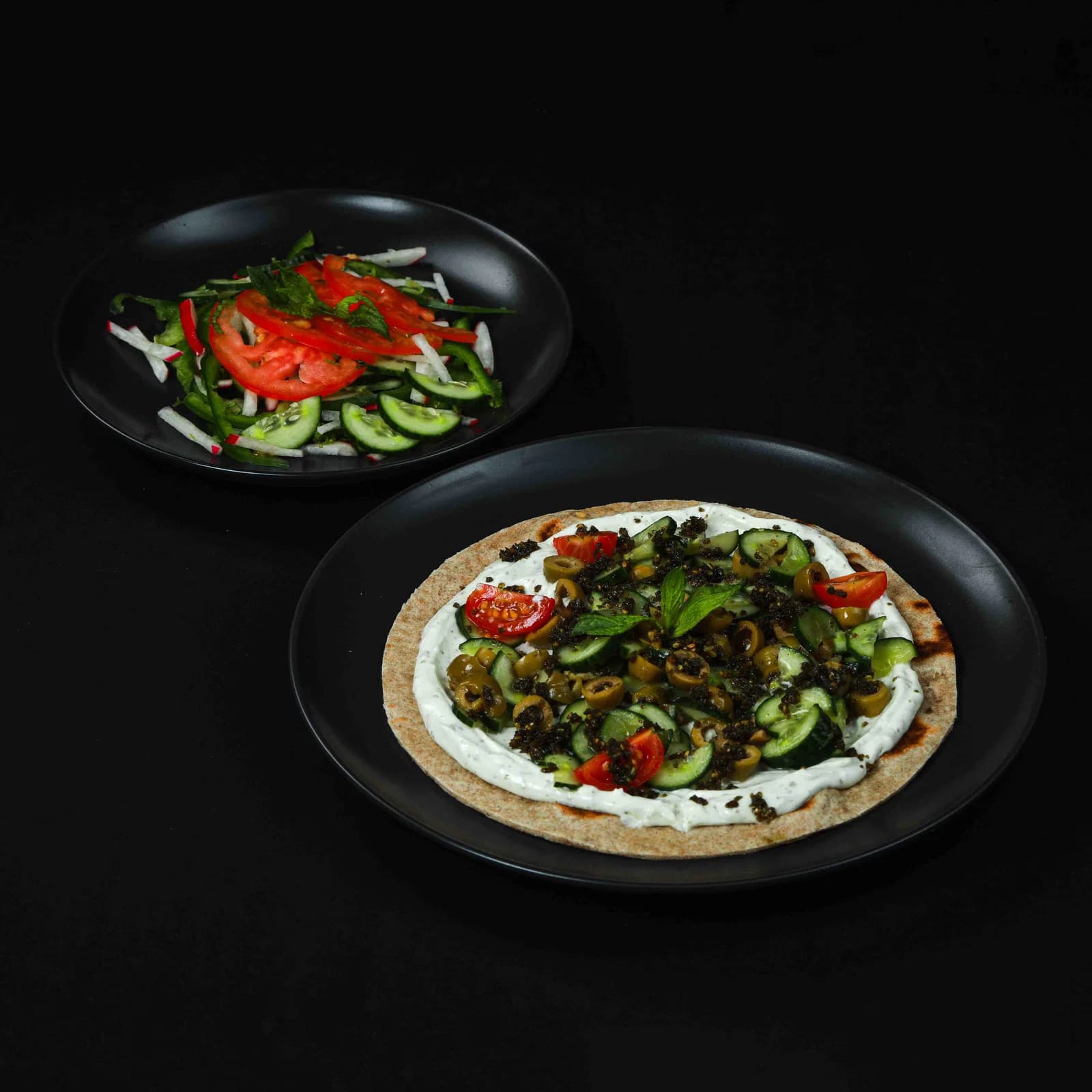 Zaatar Flatbread with Labneh, Fresh Vegetables & Olive Cucumber Salad