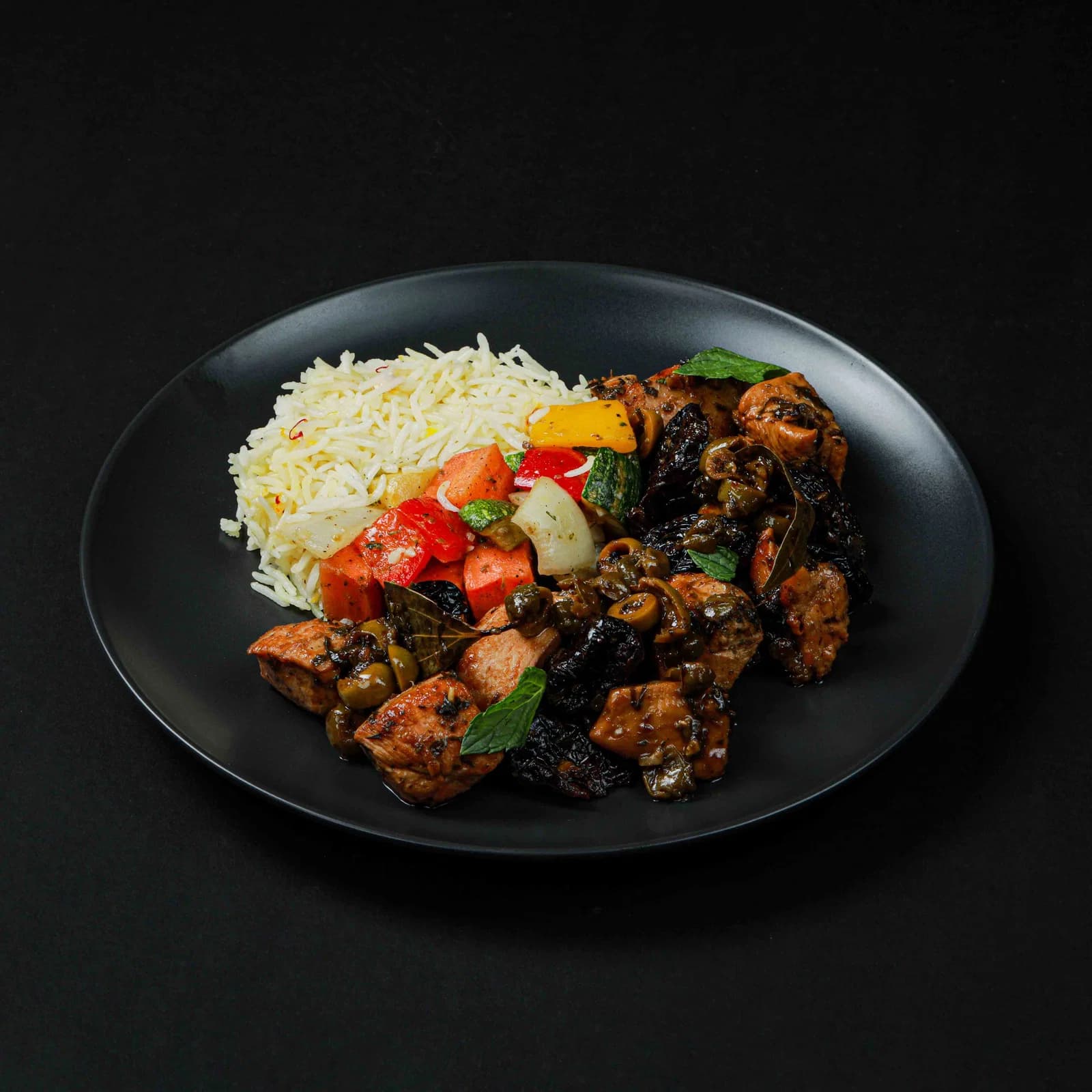 Chicken Marbella with Saffron Rice & Roasted Vegetables