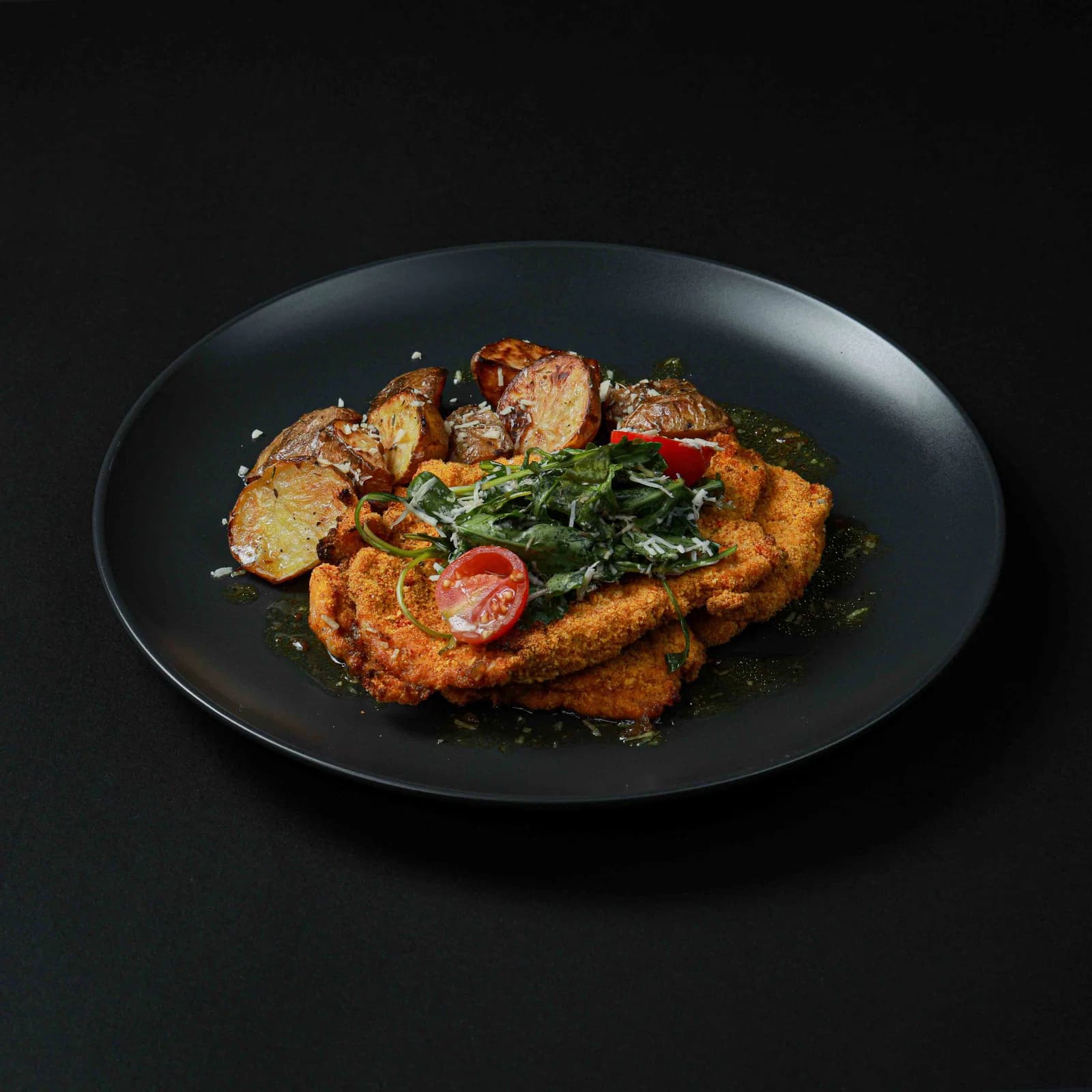 Chicken Milanese With Rosemary Roasted Potatoes & Rocket Parmesan Salad